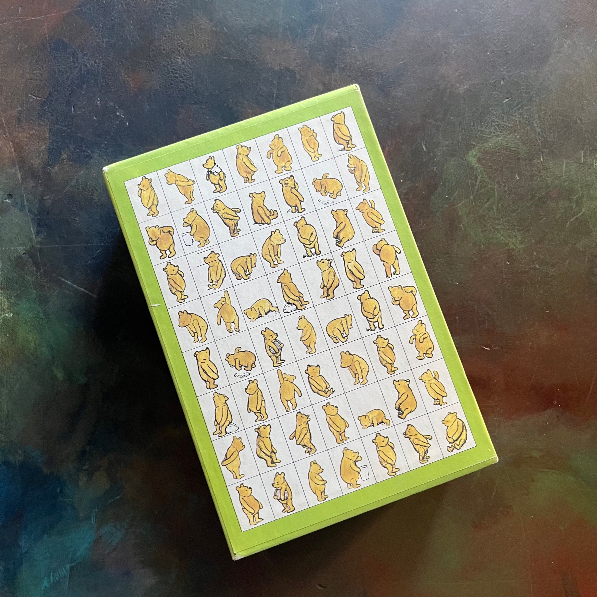 Pooh's Library - Winnie the Pooh Box Set-A. A. Milne-E. H. Shepard-read aloud revival books-vintage children's short stories-view of the side of the box sleeve with illustrations of Winnie the Pooh all over it