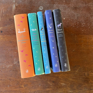 Puffin Children's Classics Book Set-5 Titles-The Adventures of Huckleberry Finn, The Wind in the Willows, The Call of the Wild, Black Beauty & Peter Pan-view of the spines