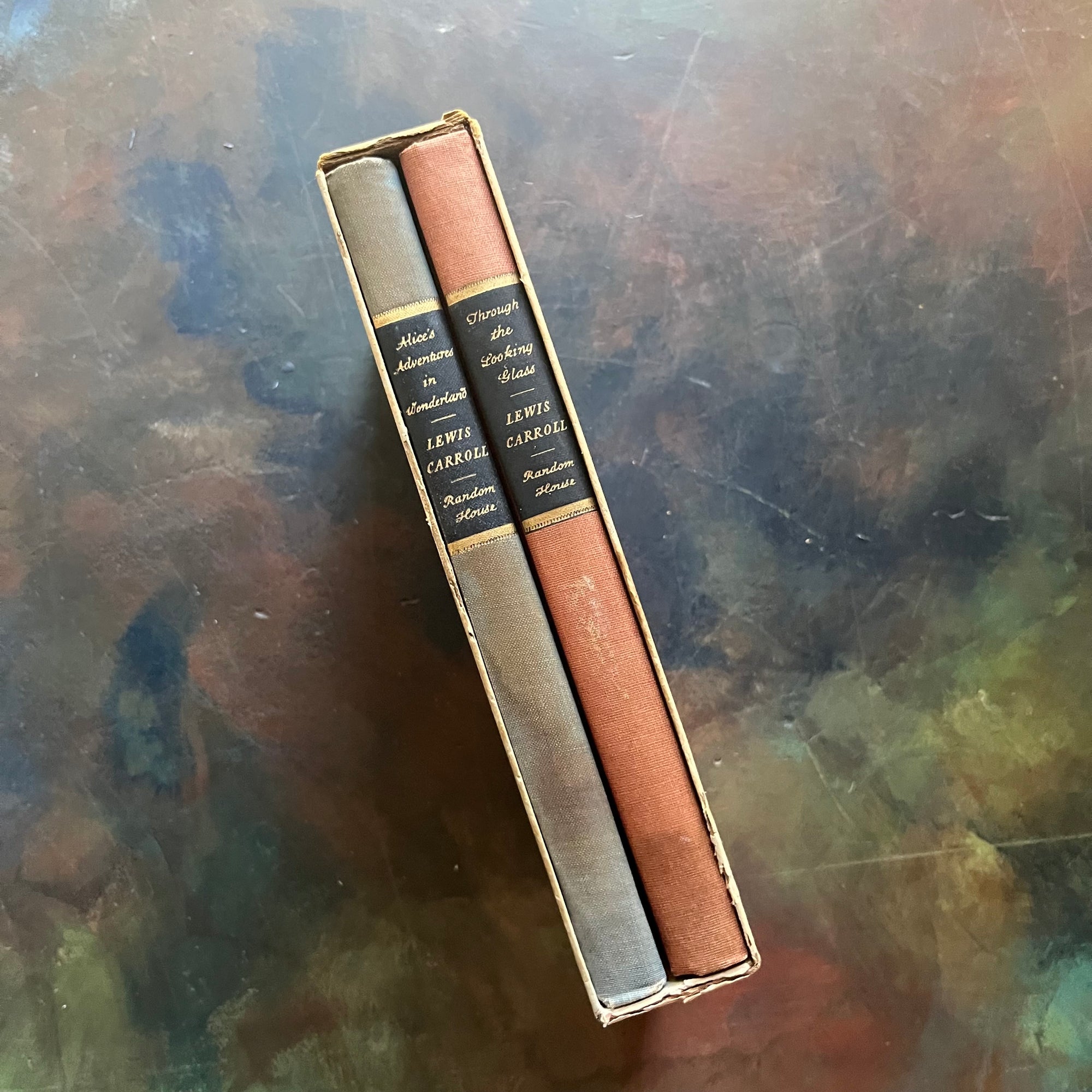 Random House Centennial Edition in Book Sleeve-Alice's Adventures in Wonderland-Through the Looking Glass & What Alice Saw There written by Lewis Carroll with illustrations by John Tenniel colored by Fritz Kredel-vintage children's classics-cabin100 book-view of the spines