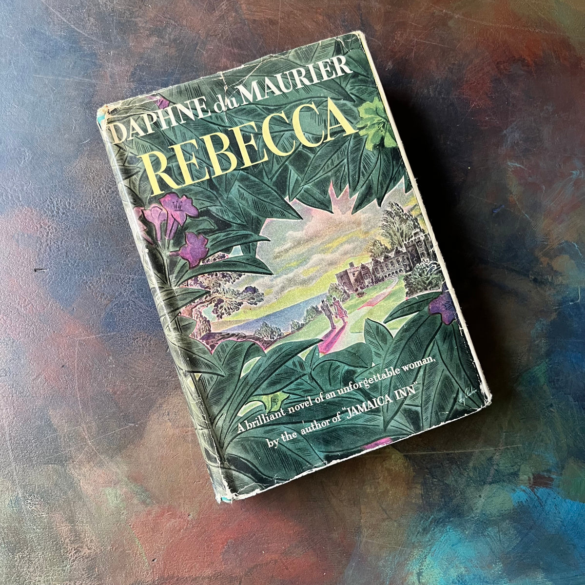 Rebecca by Daphne du Maurier-classic literature-1941 Edition-view of the dust jacket's front cover-please note the wear around the edges