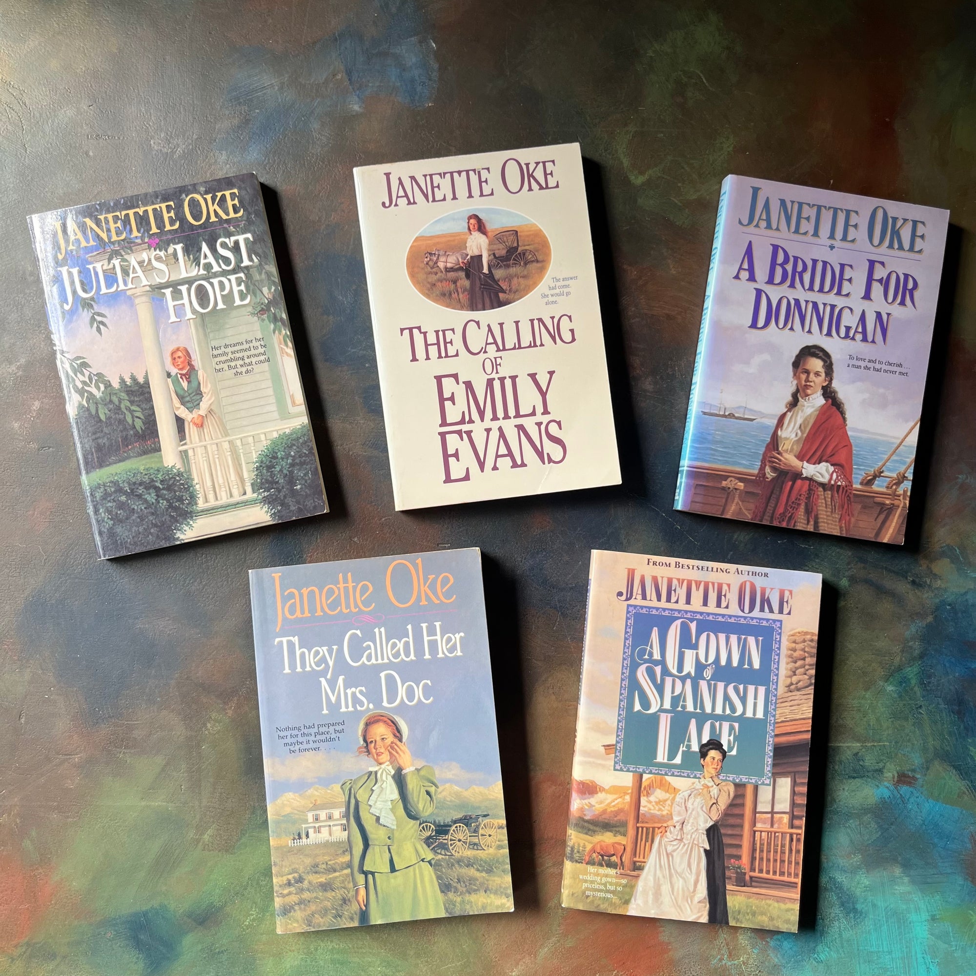 Set of Five Janette Oke Books-Julia's Last Hope-The Calling of Emily Evans-A Bride for Donnigan-They Called Her Mrs. Doc-A Gown of Spanish Lace-vintage living books with a Christian theme-front covers with illustrations of each title character