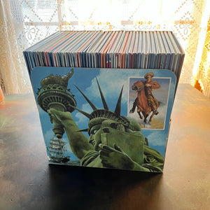 Set of 34 Cornerstones of Freedom History Books for Children in cardboard sleeve holder-vintage US History Picture Books-Early Readers-America250-view of the back of the cardboard holder