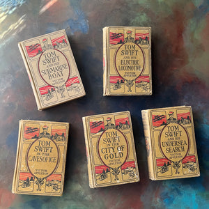 Set of 5 Antique Tom Swift Books written by Victor Appleton & Including-Submarine Boat-Electric Locomotive-Undersea Search-Caves of Ice-City of Gold-antique children's mystery books-view of the front covers