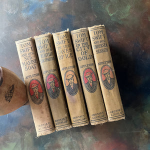 Set of 5 Antique Tom Swift Books written by Victor Appleton & Including-Submarine Boat-Electric Locomotive-Undersea Search-Caves of Ice-City of Gold-antique children's mystery books-view of the spines