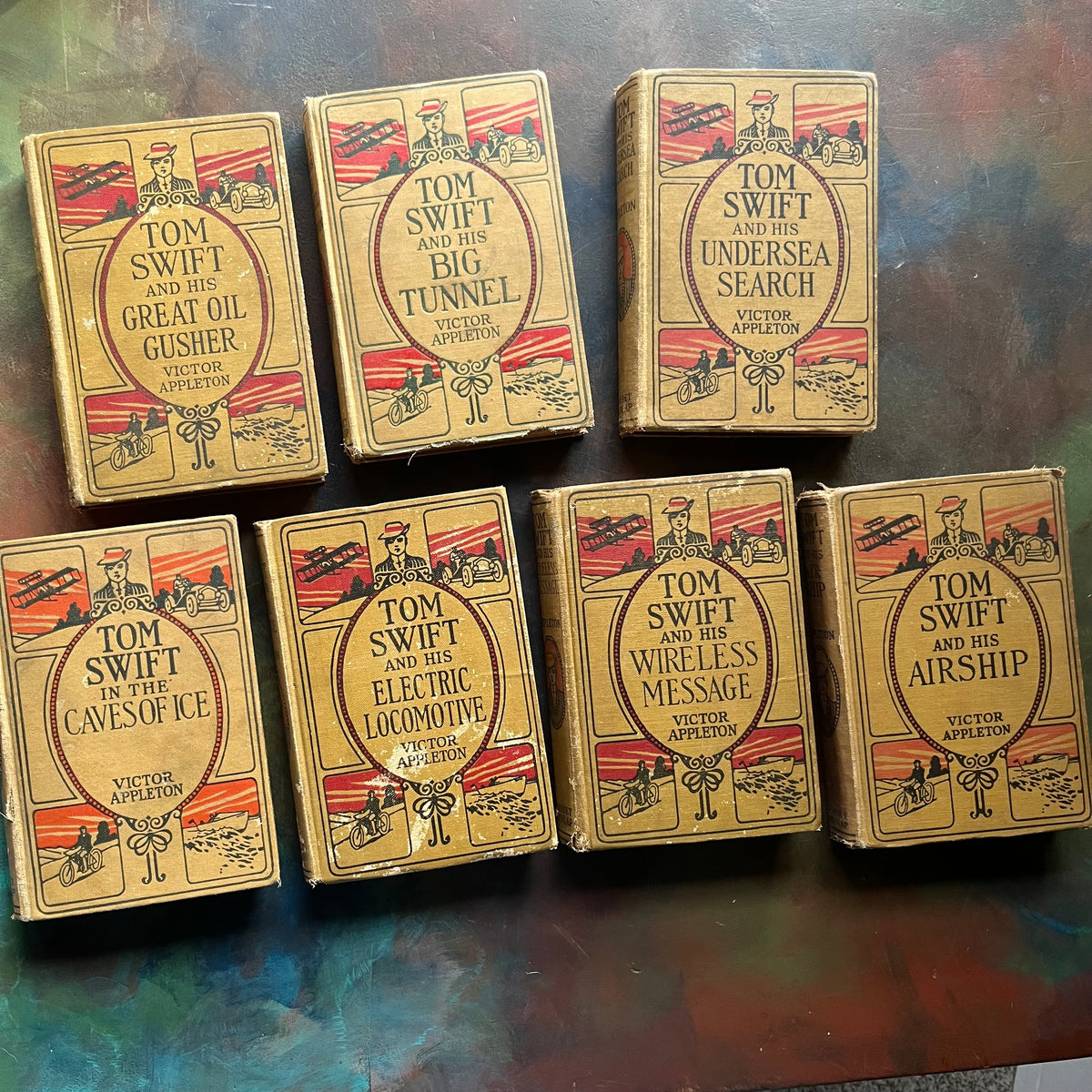 Set of 7 antique Tom Swift Books by Victor Appleton-sci fi books for boys-early 1900's adventure books for boys-view of the front covers