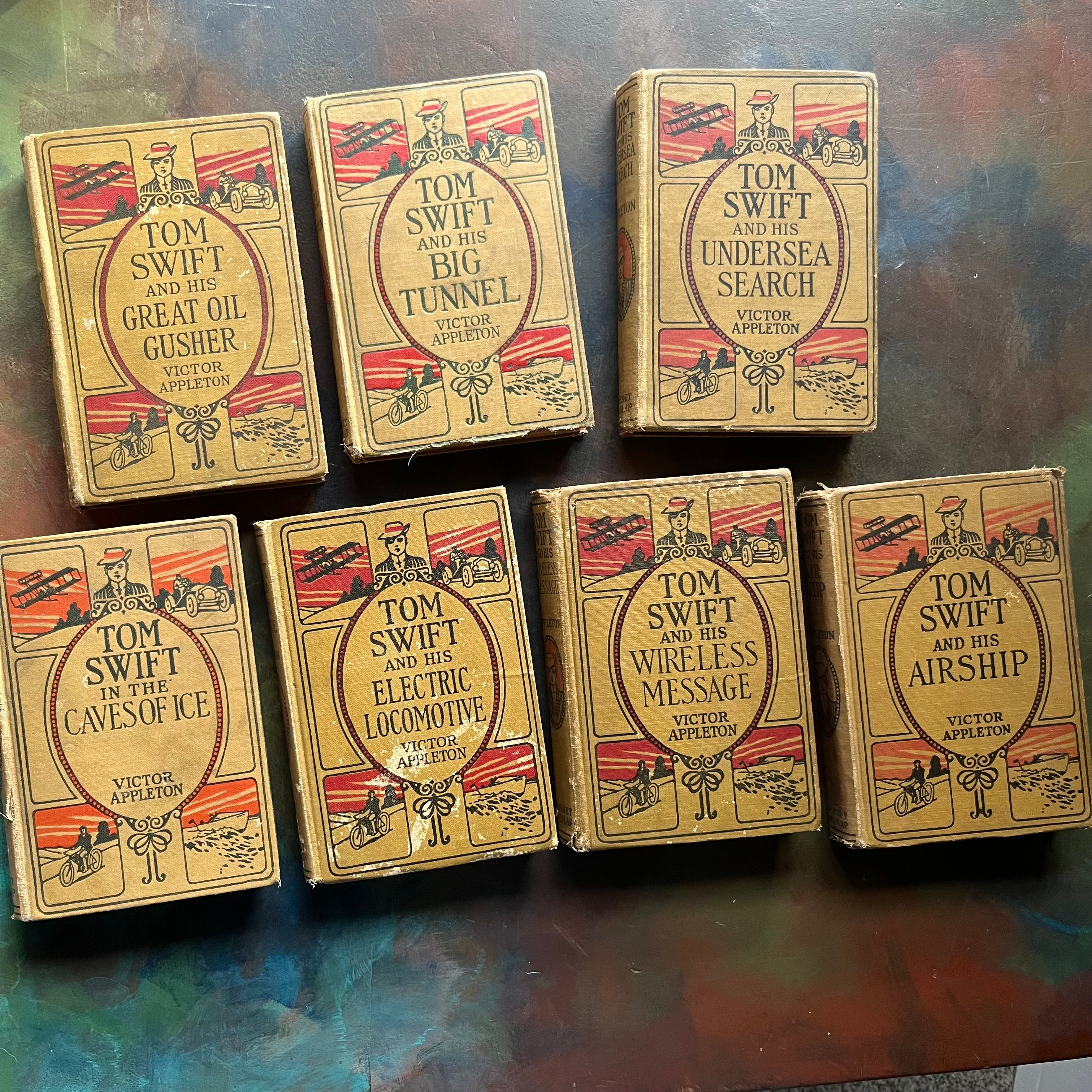 Set of 7 antique Tom Swift Books by Victor Appleton-sci fi books for boys-early 1900's adventure books for boys-view of the front covers