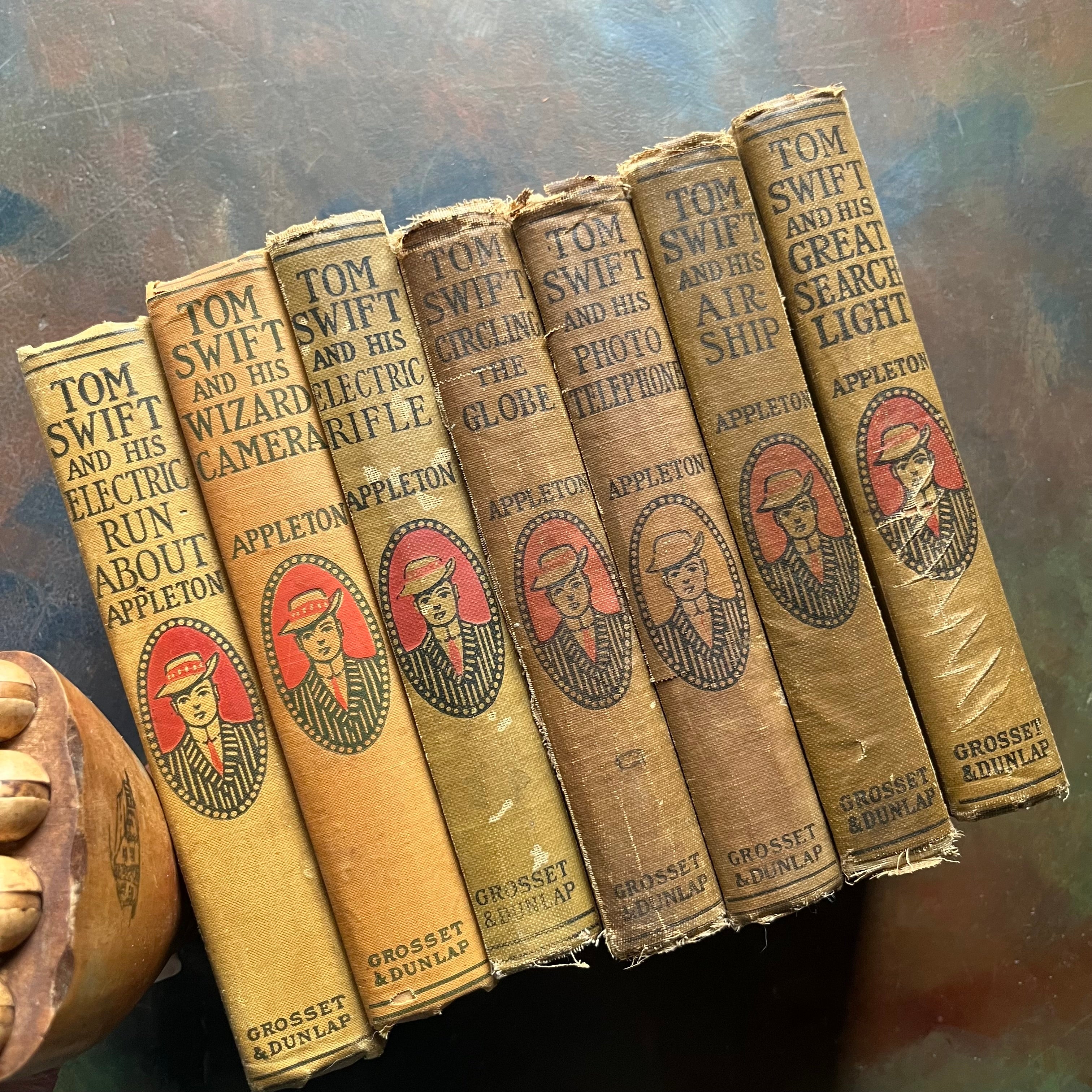 Set of 7 antique Tom Swift Books written by Victor Appleton-sci fi books for boys-early 1900's adventure books for boys-view of the spines