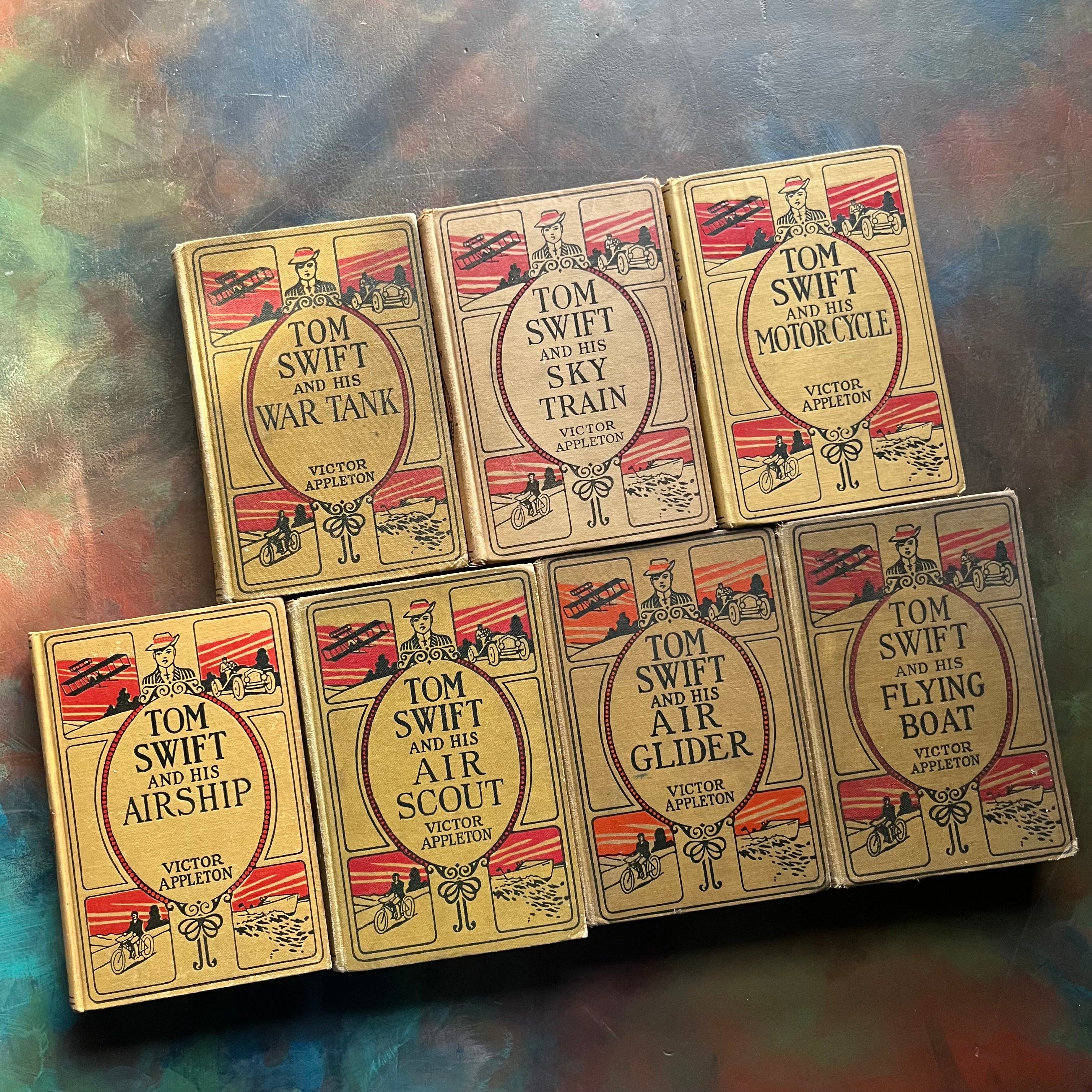 Set of 7 antique Tom Swift Books written by Victor Appleton-sci fi books for boys-early 1900's adventure books for boys-view of the front covers