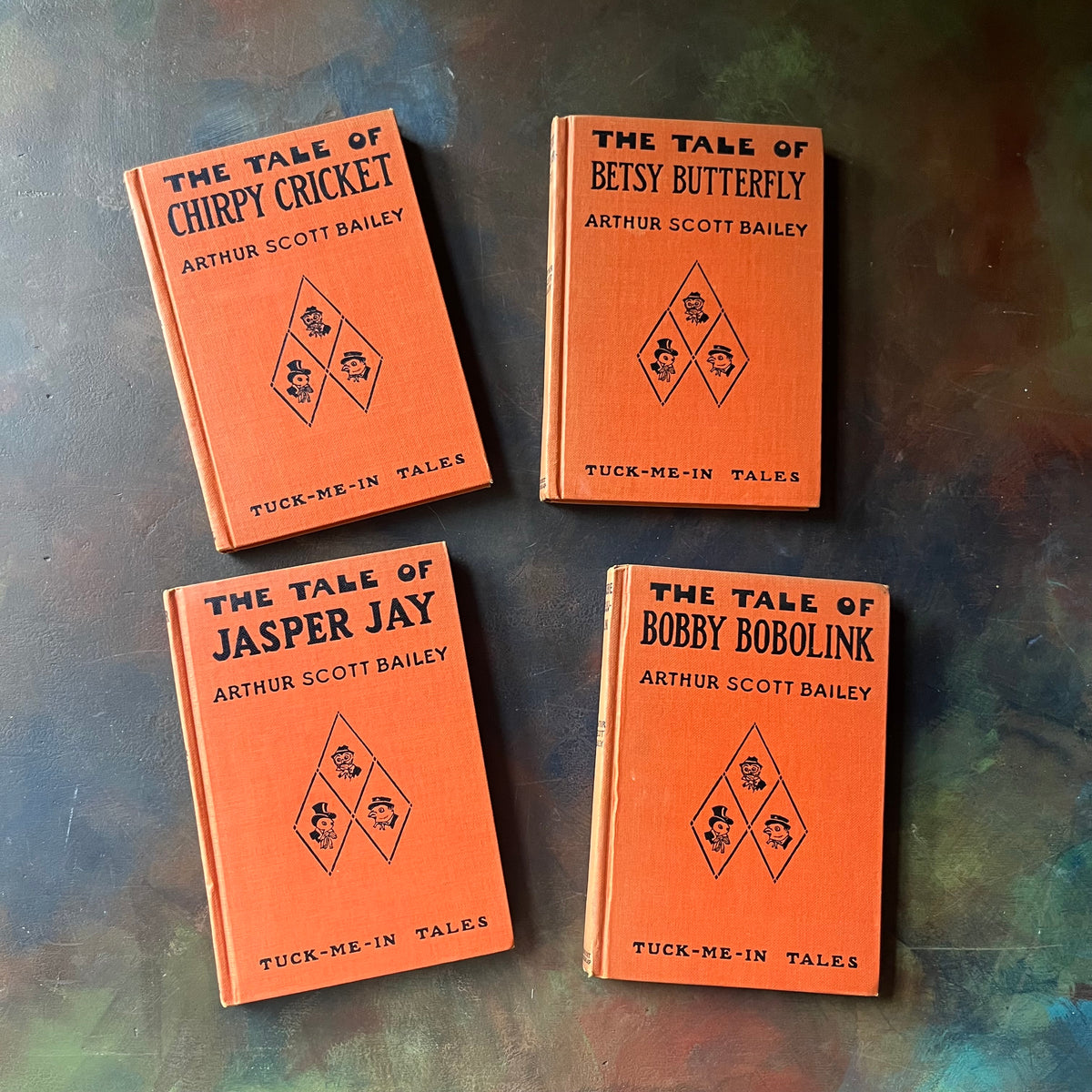 Set of Four Tuck-Me-In Tales written by Arthur Scott Bailey-Jasper Jay-Bobby Bobolink-Betsy Butterfly-Chirpy Cricket-vintage short stories-read a-loud books-view of the front covers