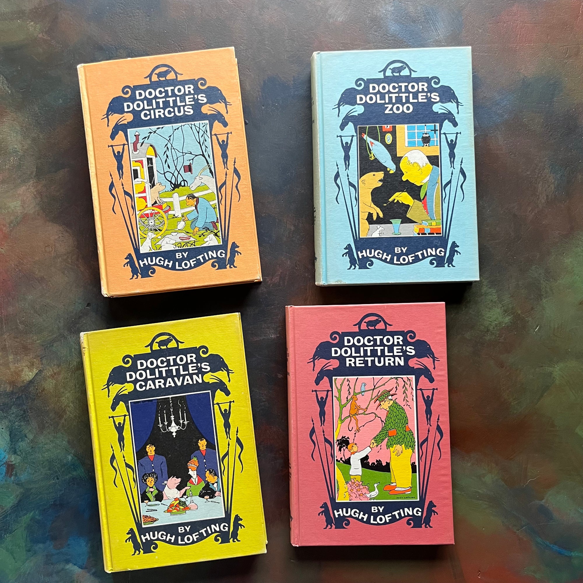 Set of Four Doctor Dolittle Books written & illustrated by Hugh Lofting-Circus, Zoo, Caravan & Return-vintage children's chapter books-view of the front covers