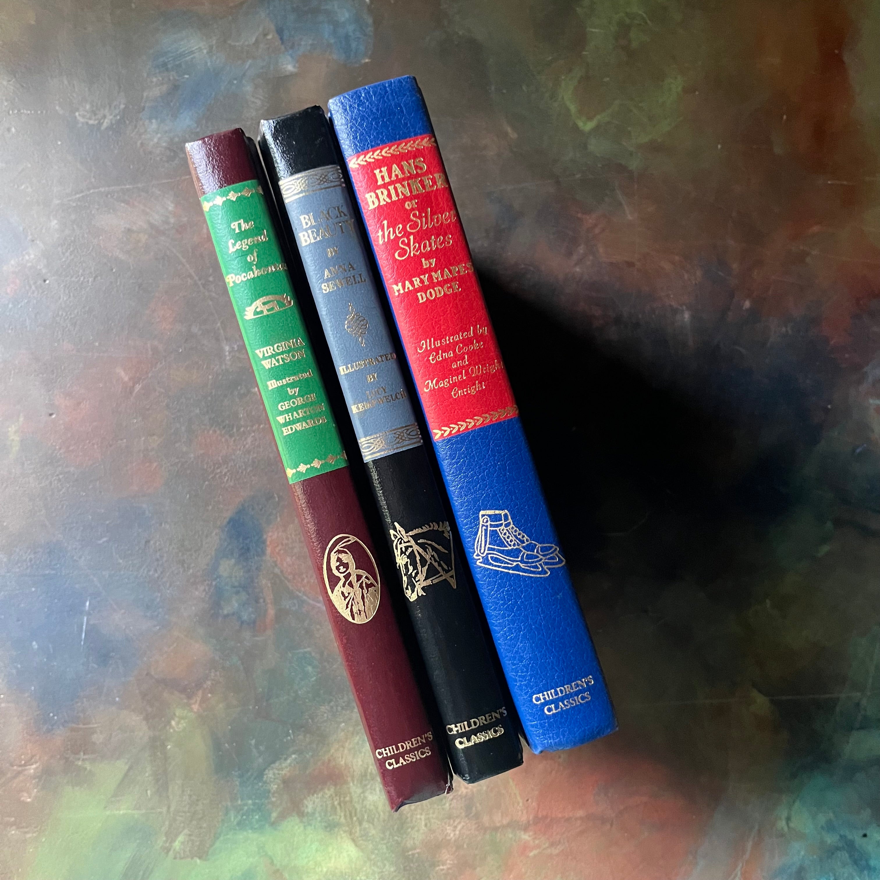 Set of Three 1980's Children's Classics Editions-Hans Brinker-Black Beauty-The Legend of Pocahontas-perfect read-aloud books-view of the spines