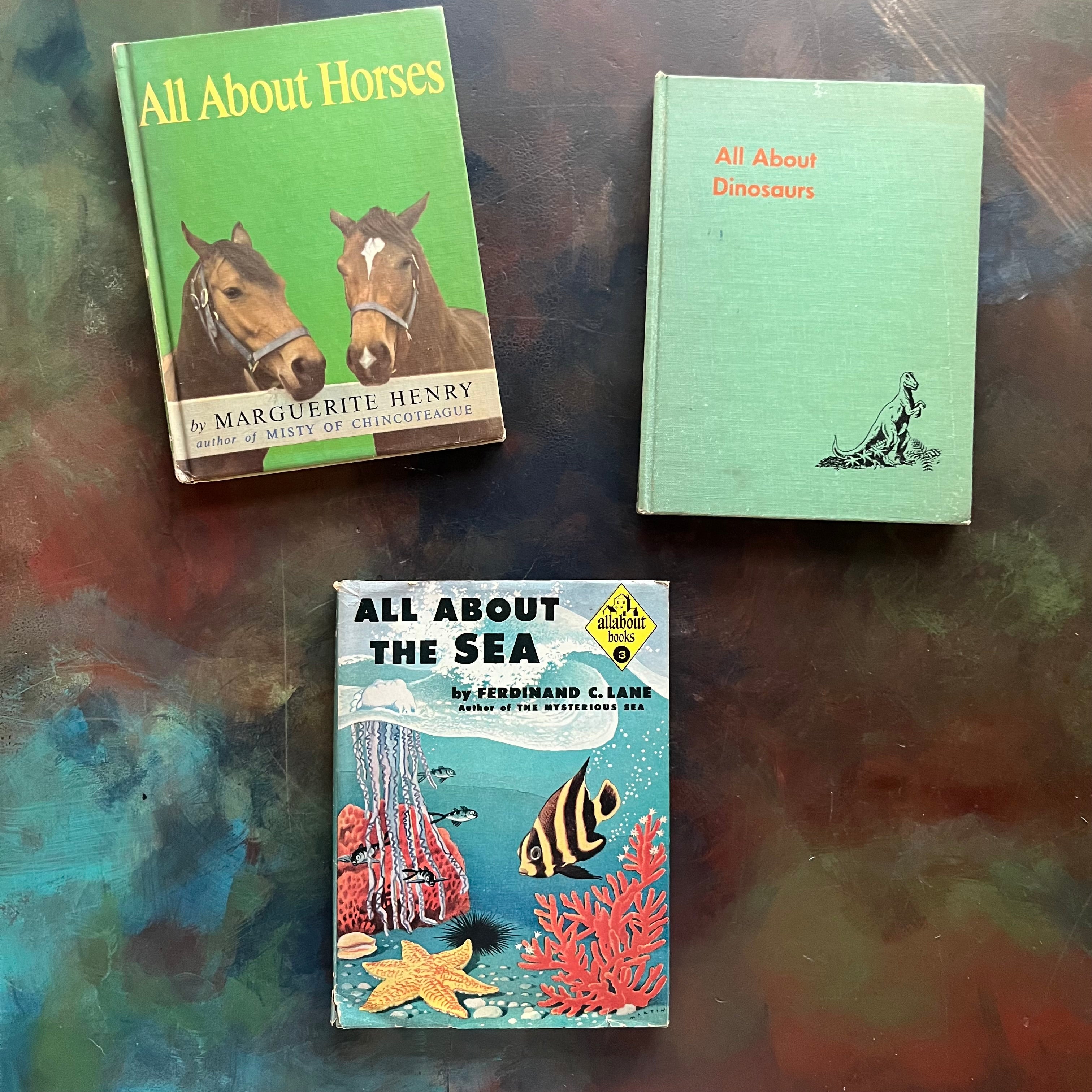 Set of Three All About Books-All About Horses-All About Dinosaurs-All About The Sea-science books for kids-vintage books for children-view of the front covers with the dust jacket on All About the Sea