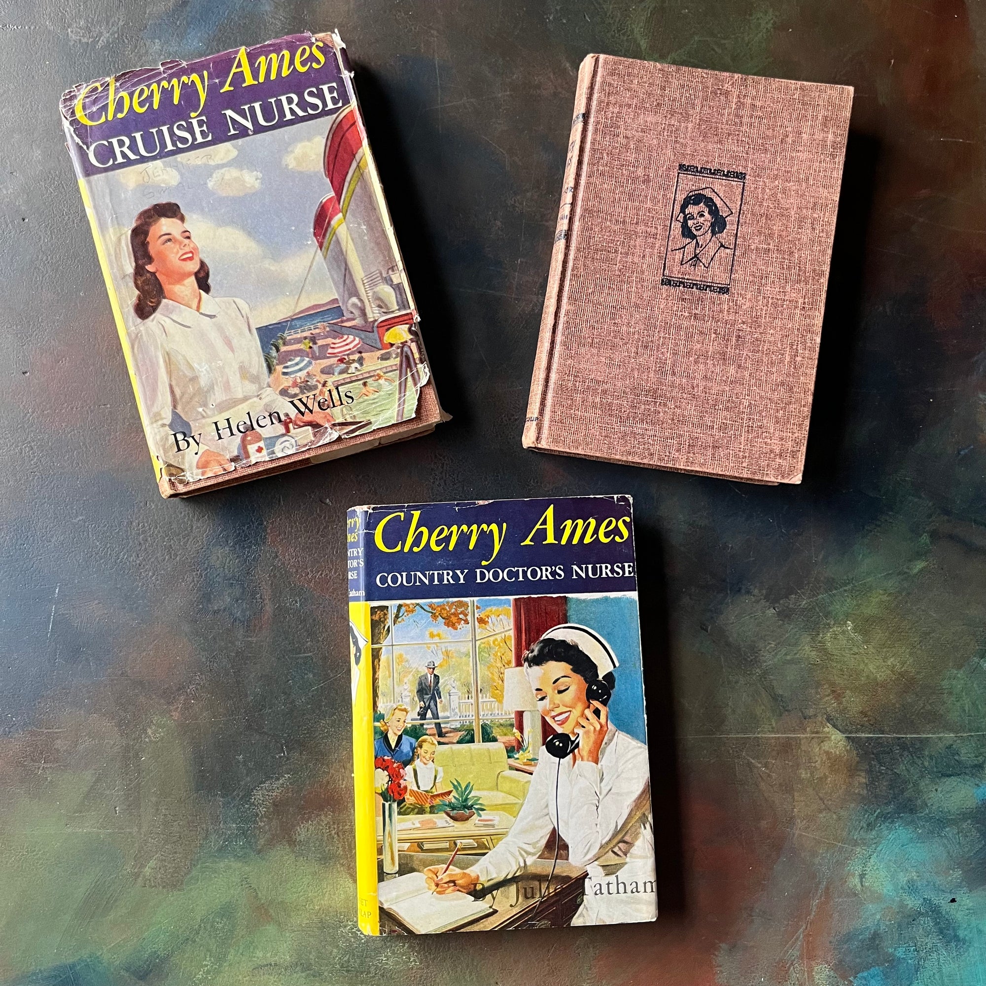 Set of Three Cherry Ames Nurse Books-vintage children's mystery books-children's chapter books-vintage mysteries-Helen Wells-Julie Tatham-view of the front covers with two dust jackets