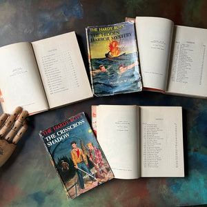 Set of Three Hardy Boys Mysteries with Brown Covers & Dust Jackets written by Franklin W. Dixon-vintage children's mysteries-view of the copyright & contents pages
