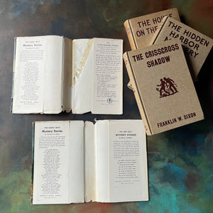 Set of Three Hardy Boys Mysteries with Brown Covers & Dust Jackets written by Franklin W. Dixon-vintage children's mysteries-view of the dust jacket's inside flaps