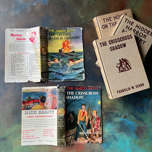 Set of Three Hardy Boys Mysteries with Brown Covers & Dust Jackets written by Franklin W. Dixon-vintage children's mysteries-view of the outside of the dust jackets