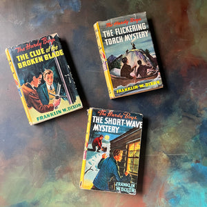 Set of Three Hardy Boys Mystery Books with Dust Jackets:  The Clue of the Broken Blade, The Flickering Torchlight Mystery and The Short-Wave Mystery-Franklin W. Dixon-vintage children's chapter books-vintage mysteries for young readers-view of the dust jacket's front covers