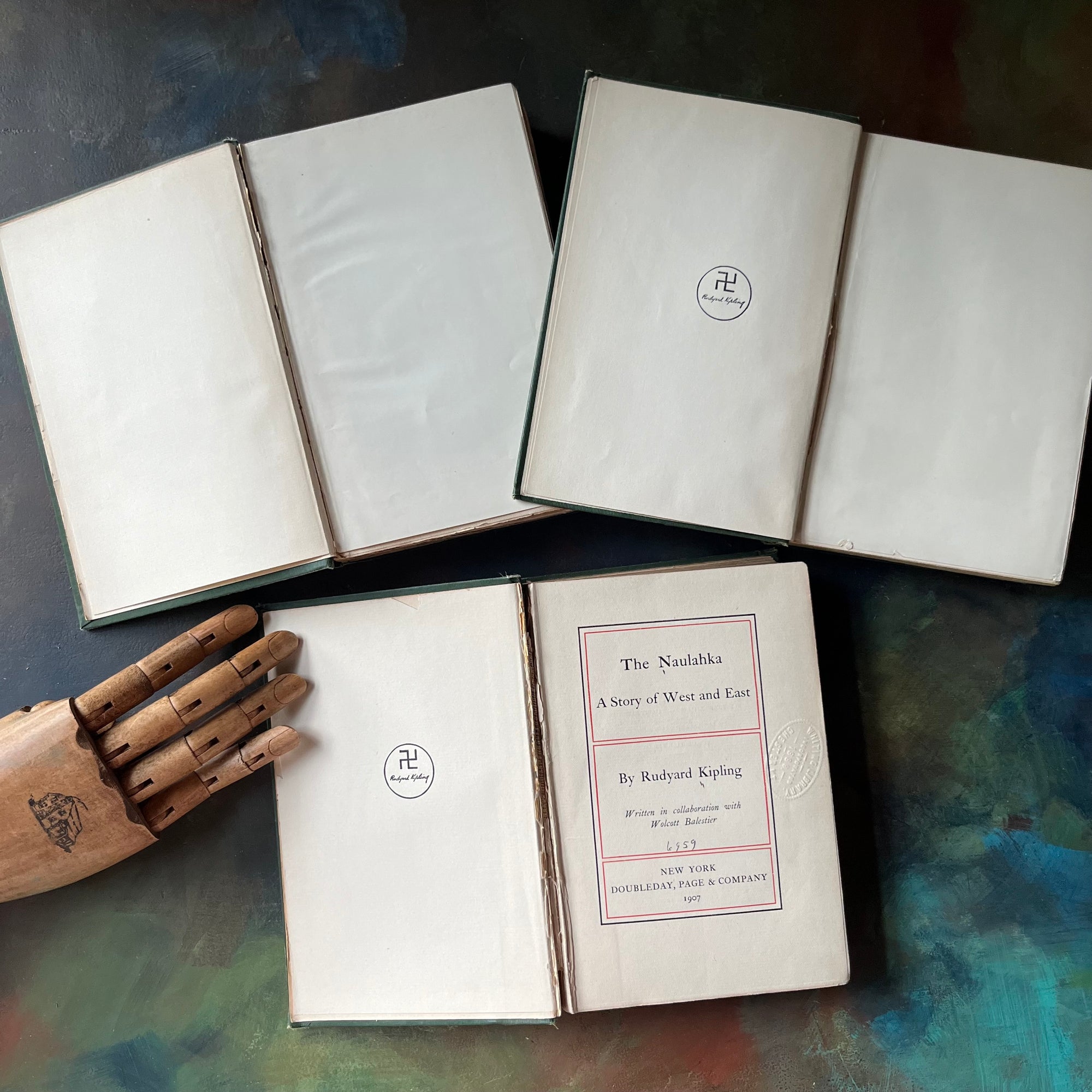 Set of Three Rudyard Kipling Novels-The Day's Work-Stalky & Co.-The Naulahka-vintage fiction-view of the symbol inside two of the books