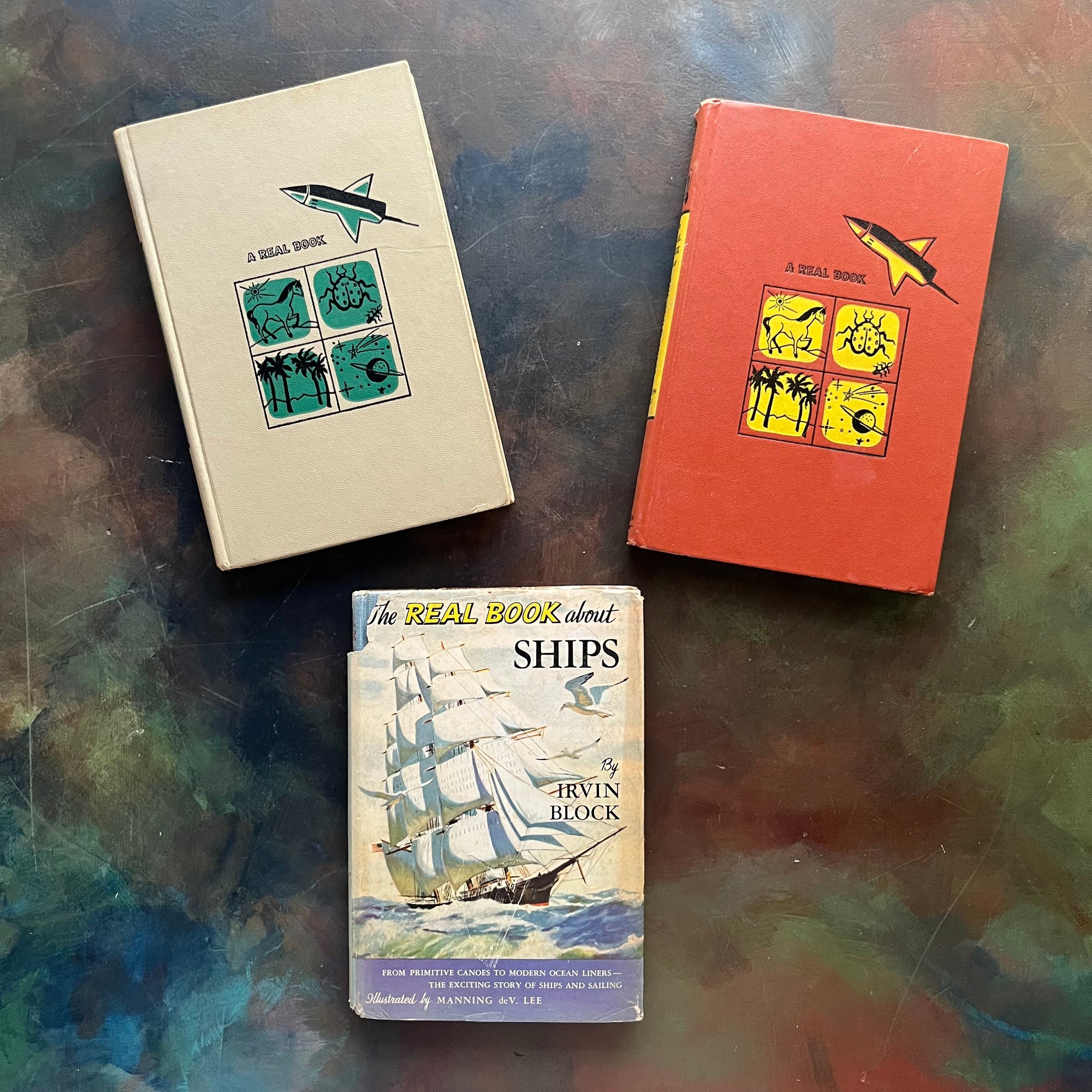 Set of Three The Real Book About Books-Ships-The Wild West-Great American Journeys-living history books for kids-vintage children's books-view of the front covers with Ships showing its dust jacketed cover