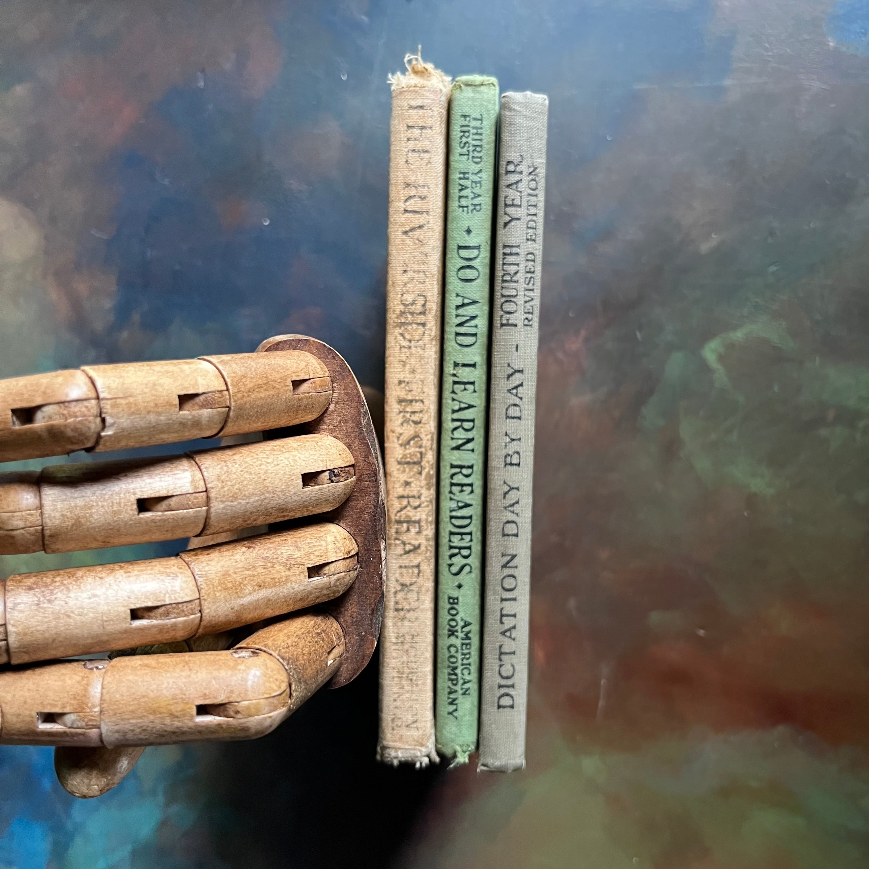 Set of Three Vintage School Books-Dictation by Day, Interesting Things to Know, and The Riverside Readers First Reader-view of the spines