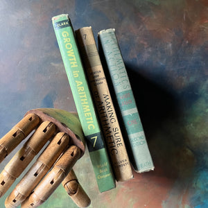 Set of Three Vintage School Mathematics Arithmetic Books-Growth in Arithmetic-Making Sure of Arithmetic-Mathematics in Action-view of the spines