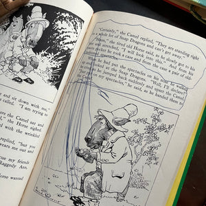 Set of four Raggedy Ann and Andy books written and illustrated by Johnny Gruelle-classic children's stories-heartwarming stories for children-view of the scribble in one of the books.