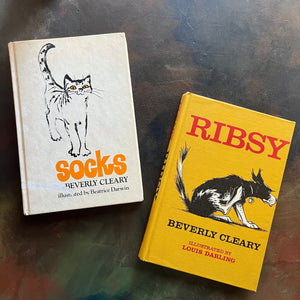 Socks and Risby written by Beverly Cleary-Weekly Reader Children's Book Club Editions-vintage children's chapter books-animal stories-view of the front covers with illustrations of both Socks the cat and Risby the dog featured on the covers