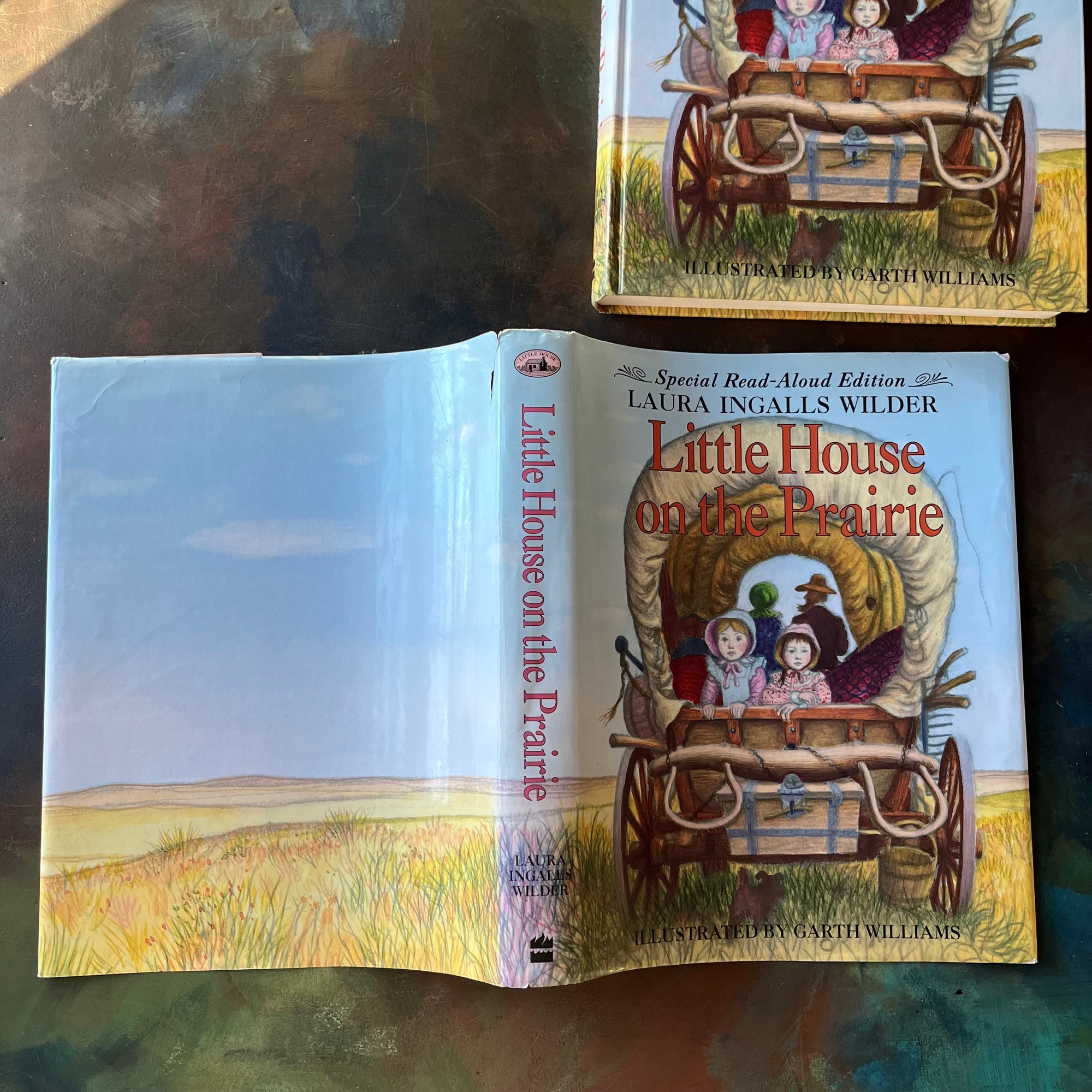 Special Read-Aloud Edition of Little House on the Prairie written by Laura Ingalls Wilder with illustrations by Garth Williams-Newbery Honor Book-vintage children's chapter book-living book-view of the dust jacket's front & back cover