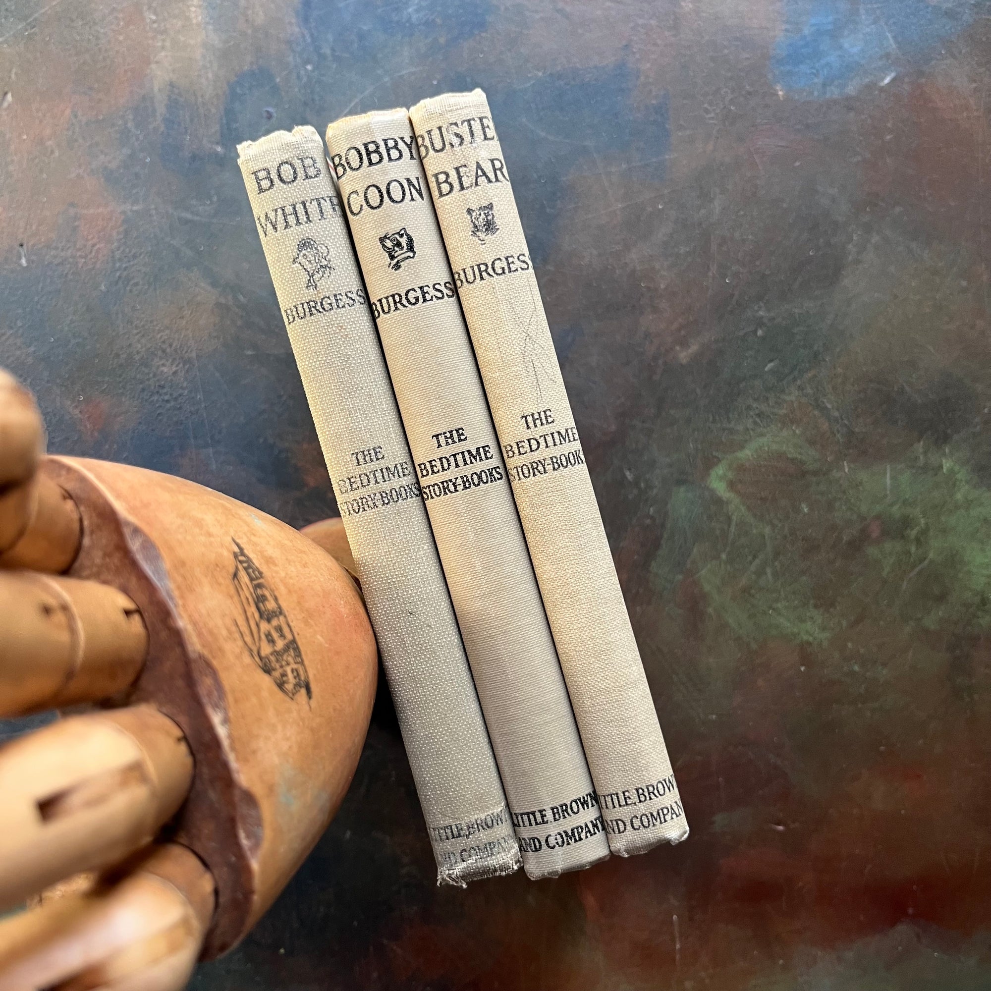 The Bedtime Story-Books written by Thornton Burgess with illustrations by Harrison Cady-The Adventures of Bob White-The Adventures of Bobby Coon, and The Adventures of Buster Bear-vintage children's stories-view of the spines