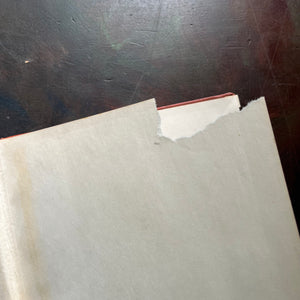 The Book of Cowboys written & illustrated by Holling C. Holling-living book-wild west-cowboy history-US expansion west-living history book-view of the tear of missing section of the inside cover's end paper where an address may have been removed.