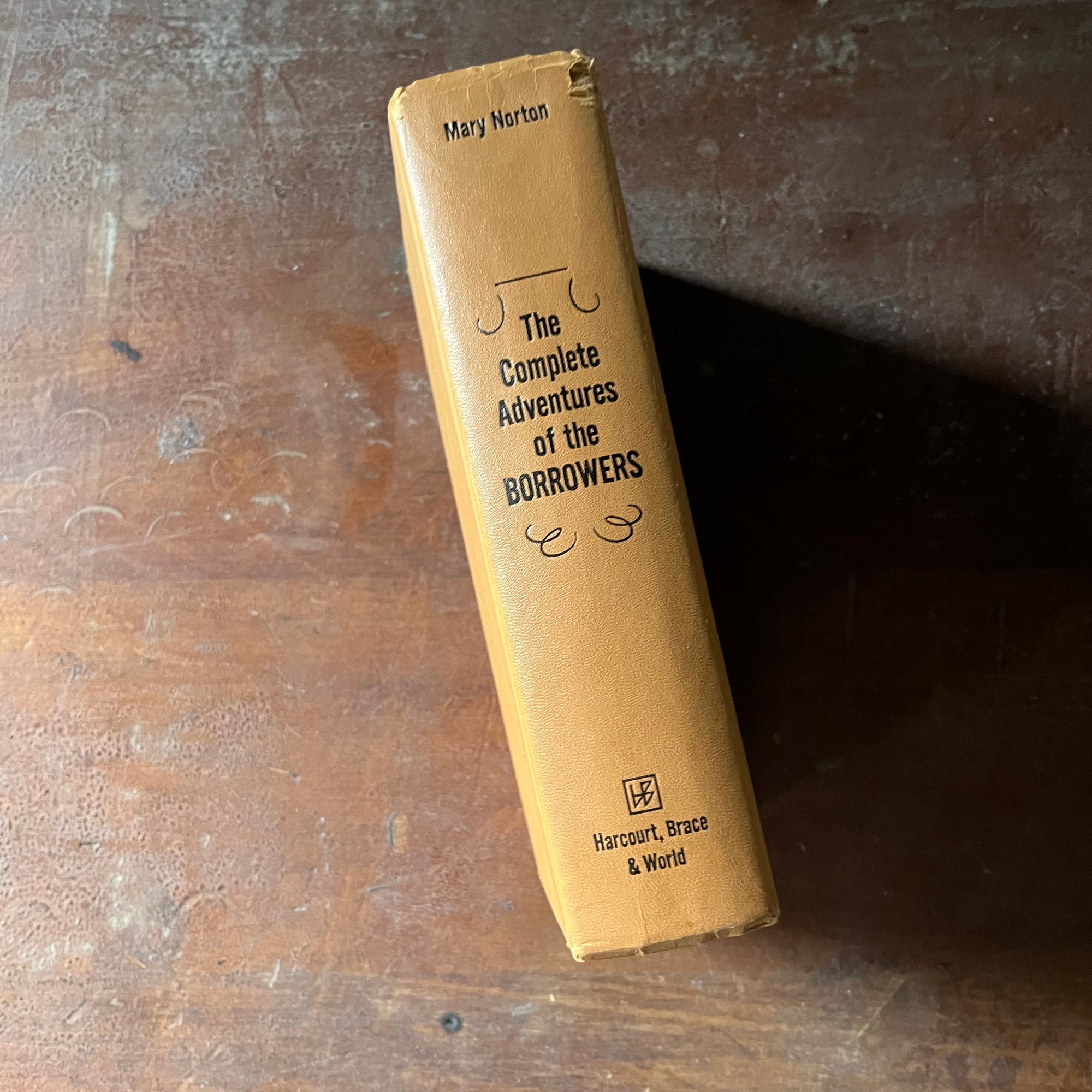 vintage children's chapter book, complete book set - The Complete Adventures of the Borrowers written by Mary Norton with illustrations by Beth & Joe Krush- view of the embossed spine