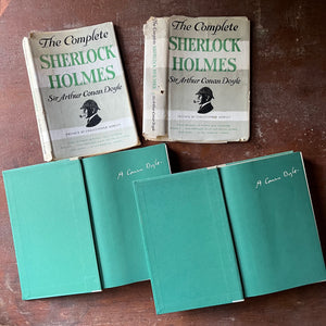 vintage mysteries - The Complete Sherlock Holmes Two Volume Book Set written by Sir Arthur Conan Doyle - view of the inside covers with A Conan Doyle printed on each end paper