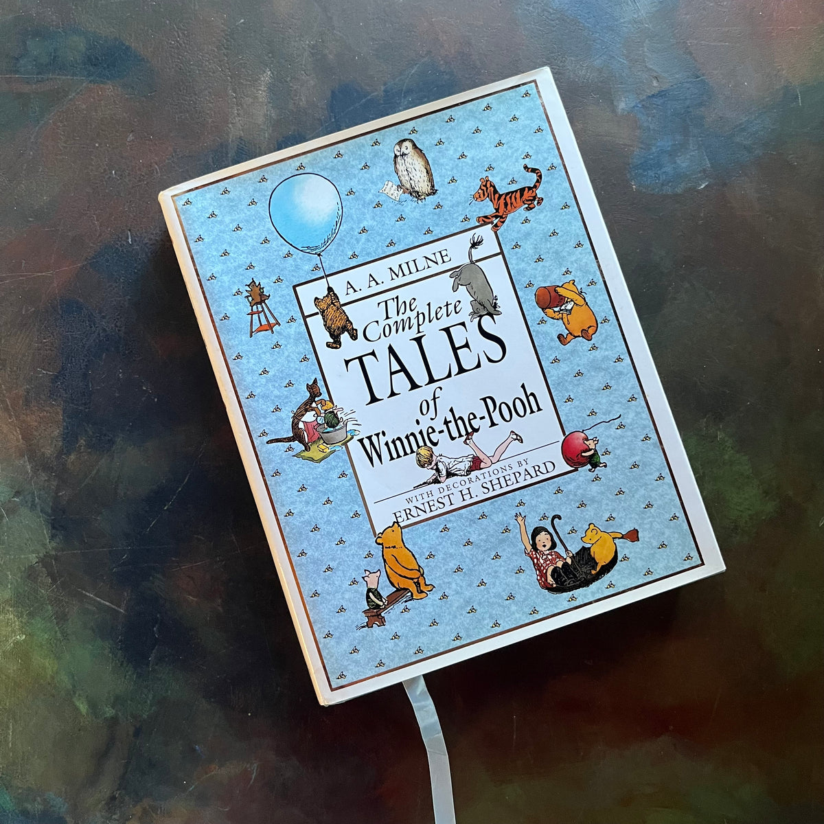 The Complete Tales of Winnie the Pooh and The House at Pooh Corner-A.A. Milne-E. H. Shepard-vintage children's classics-read aloud revival books-view of the dust jacket cover with images of your favorite animal characters from within the pages