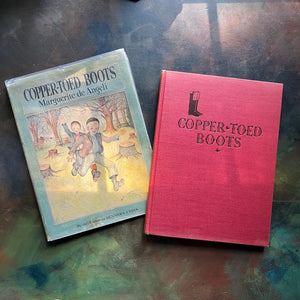 The Copper-Toed Boots written and illustrated by Marguerite de Angeli-first edition-vintage children's biography-chapter book-view of the red and black embossed cover with the book title and boots shown
