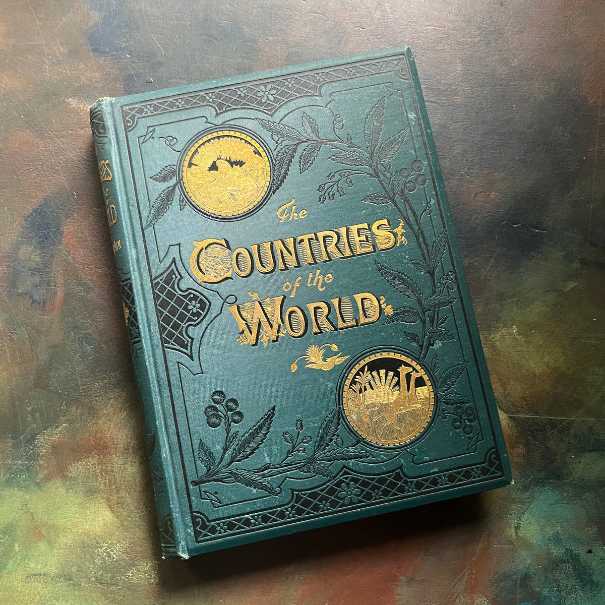 The Countries of the World written by Reverand Robert Brown-published by Cassell and Company-antique world history book-view of the embossed front cover in green and gold