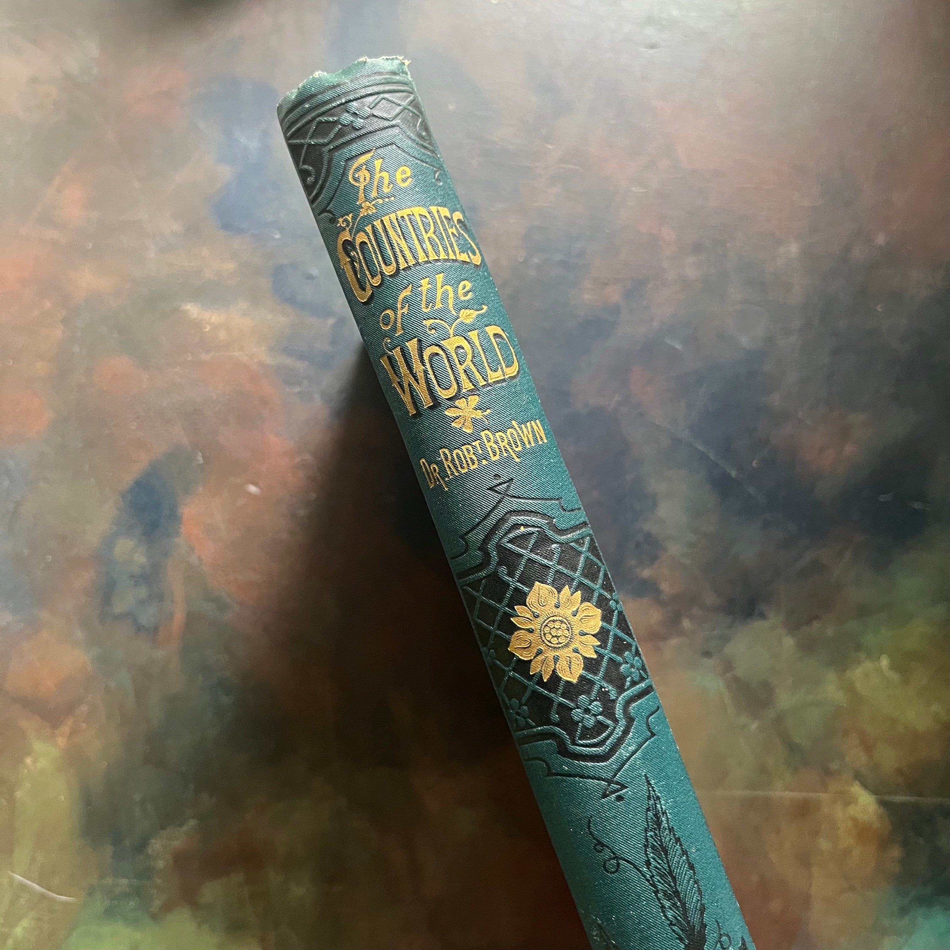 The Countries of the World written by Reverand Robert Brown-published by Cassell and Company-antique world history book-view of the spine which is also embossed in green and gold