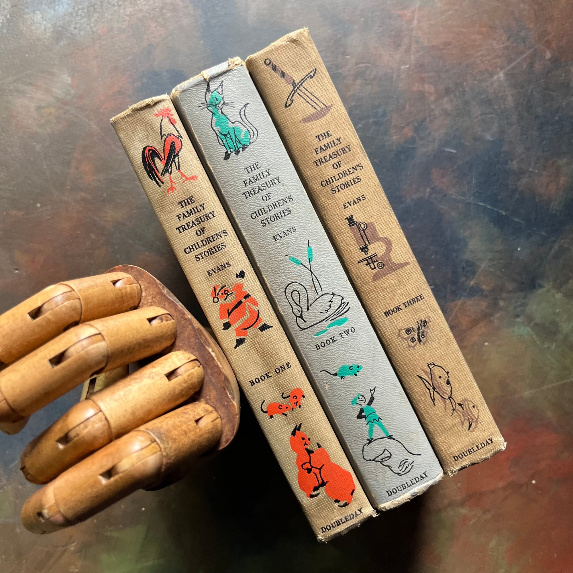 The Family Treasury of Children’s Stories-3 Volume Set-Junior Deluxe Editions-vintage children's stories-edited by Pauline Rush Evans with illustrations by Donald Sibley-view of the spines