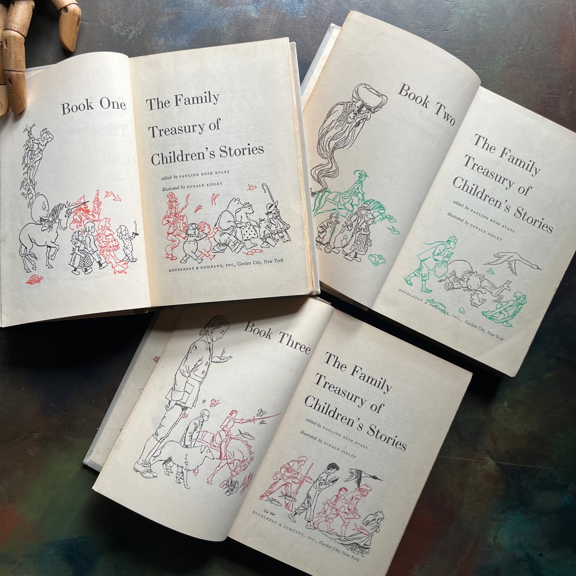 The Family Treasury of Children’s Stories-3 Volume Set-Junior Deluxe Editions-vintage children's stories-edited by Pauline Rush Evans with illustrations by Donald Sibley-view of the title pages