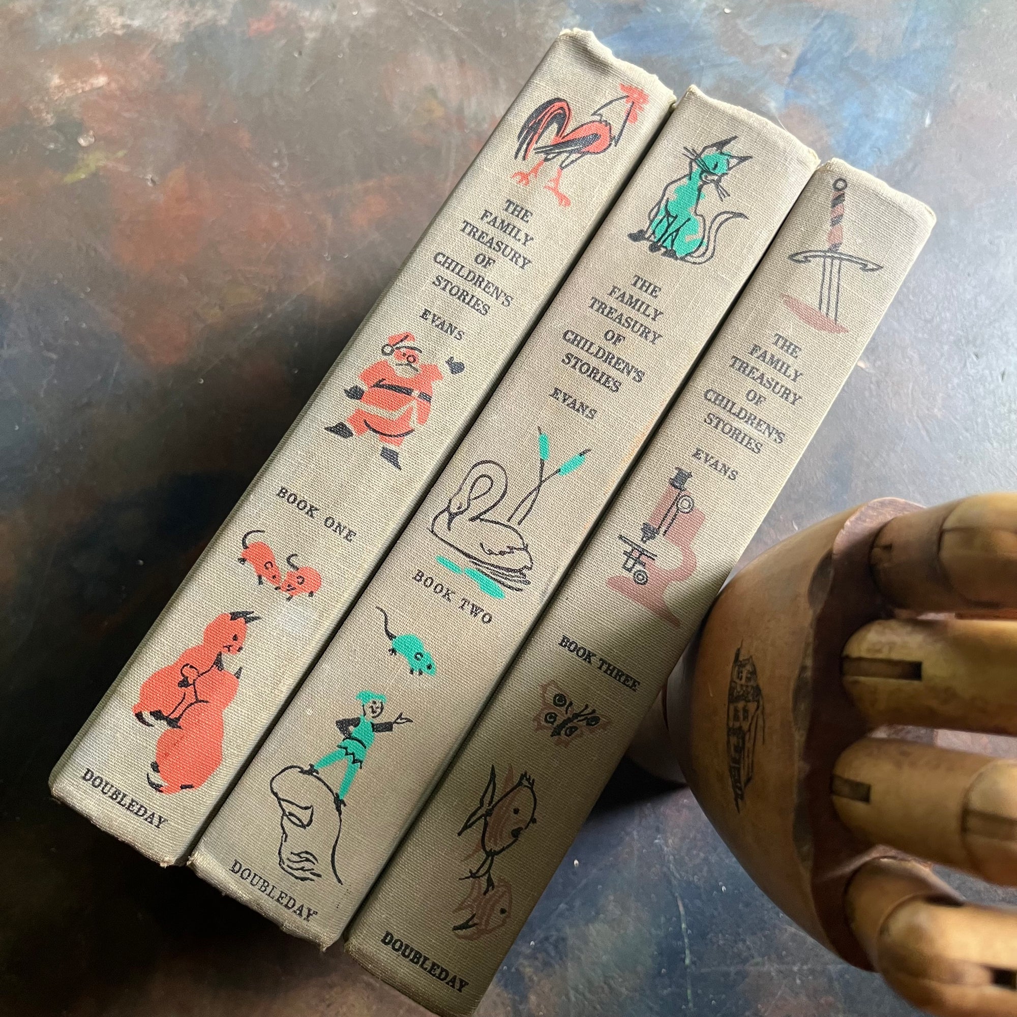 The Family Treasury of Children’s Stories-3 Volume Set-Junior Deluxe Editions-vintage children's stories-edited by Pauline Rush Evans with illustrations by Donald Sibley-view of the spines