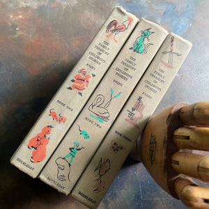 The Family Treasury of Children’s Stories-3 Volume Set-Junior Deluxe Editions-vintage children's stories-edited by Pauline Rush Evans with illustrations by Donald Sibley-view of the spines