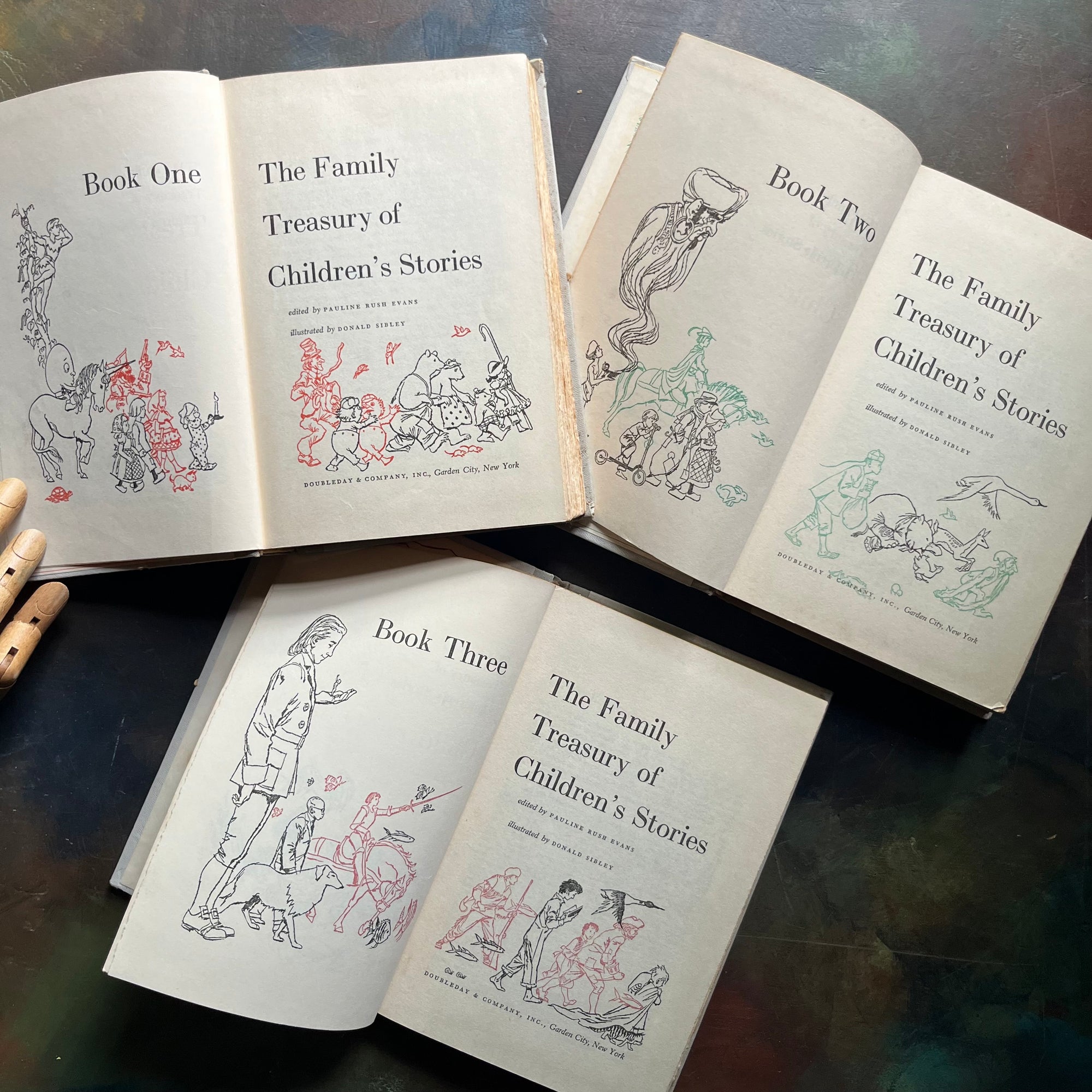 The Family Treasury of Children’s Stories-3 Volume Set-Junior Deluxe Editions-vintage children's stories-edited by Pauline Rush Evans with illustrations by Donald Sibley-view of the title pages