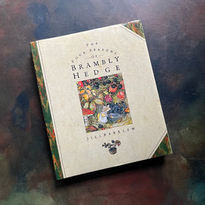 The Four Seasons of Brambley Hedge-written and illustrated by Jill Barklem-classic picture book anthology-read-aloud favorite-homeschool-favorite-view of the dust jacket's cover featuring a beautifully detailed image from one of the stories within the pages