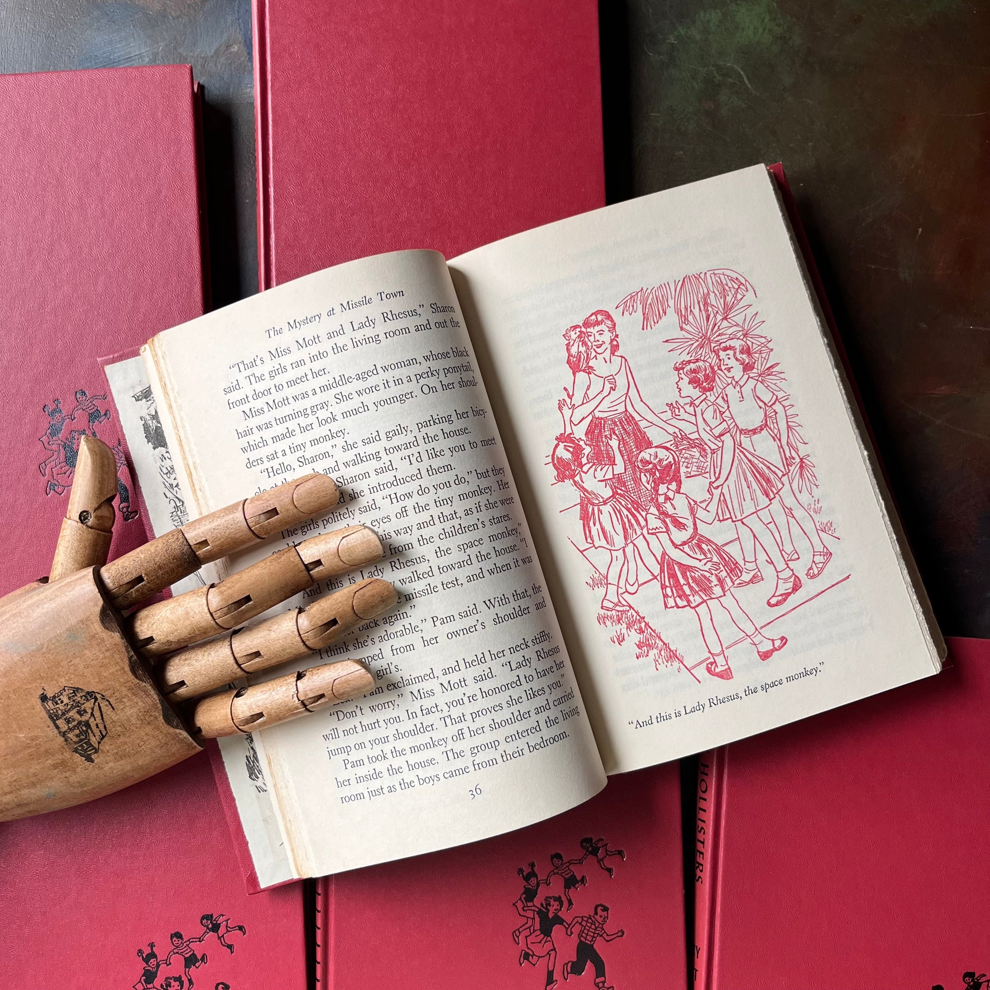 The Happy Hollisters Six Book Set-Jerry West-America's Favorite Classic Mystery Series for Young Readers-Helen Hamilton-vintage children's chapter books-view of the full-page illustrations in red
