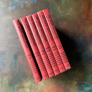 The Happy Hollisters Six Book Set-Jerry West-America's Favorite Classic Mystery Series for Young Readers-Helen Hamilton-vintage children's chapter books-view of the spines in red & black