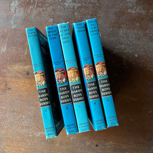 vintage adventure books for boys - The Hardy Boys Mysteries Starter Set First 5 Volumes Written by Franklin W. Dixon - view of the spines