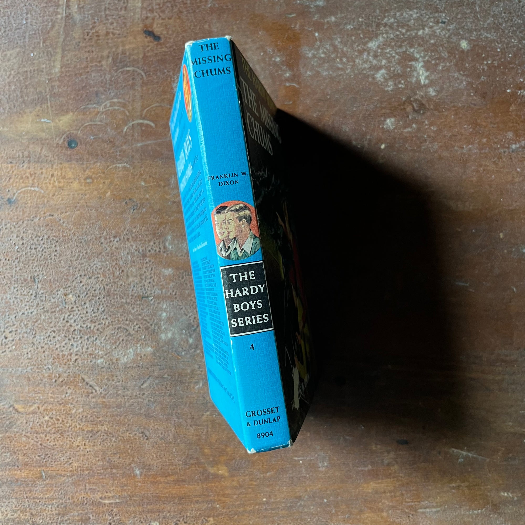 vintage children's chapter book, vintage adventure book for boys, homeschool library - The Hardy Boys Mysteries #4 The Missing Chums written by Franklin W. Dixon - view of the spine