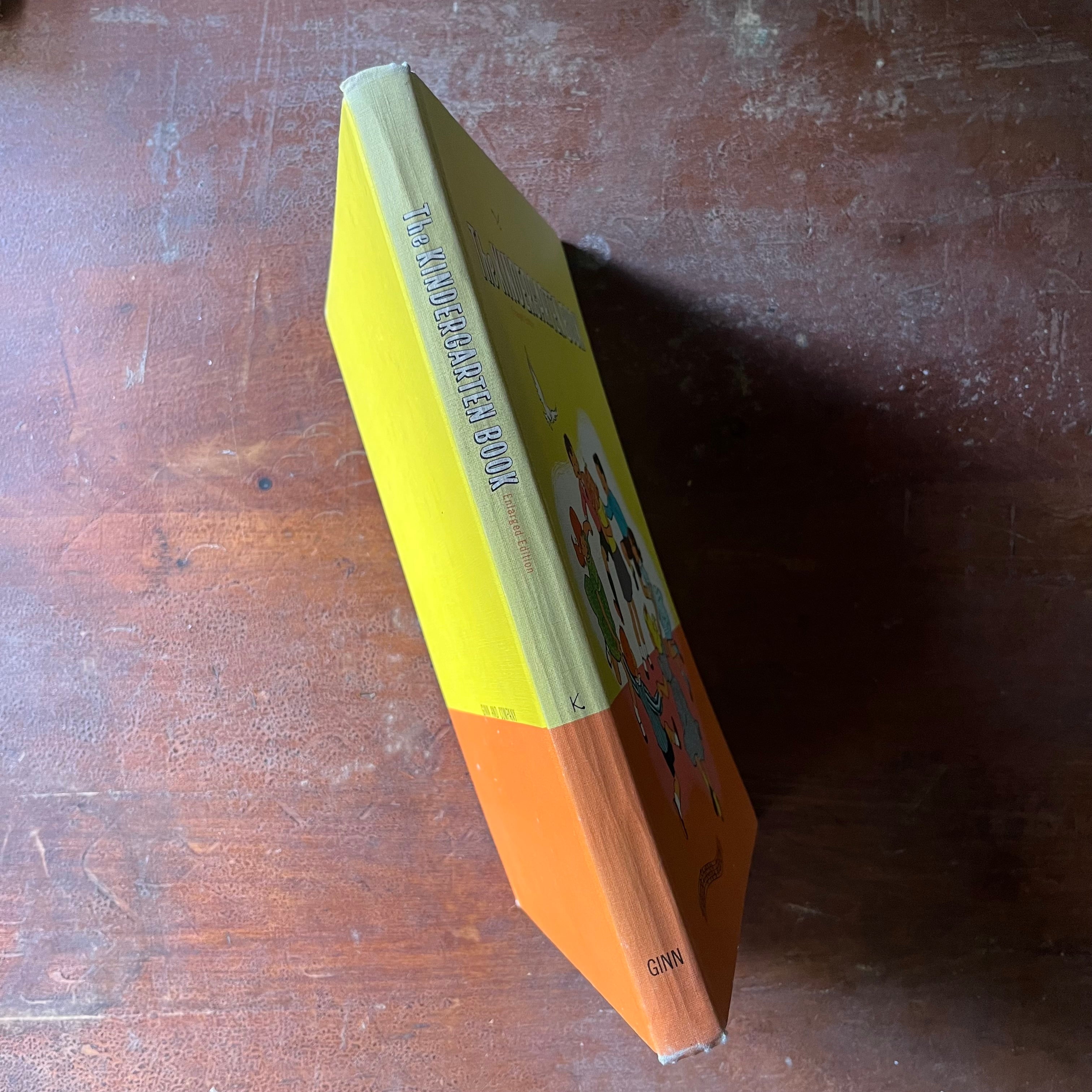 vintage children's schoolbook, vintage schoolbook - The Kindergarten Book Enlarged Edition Our Singing World - view of the spine