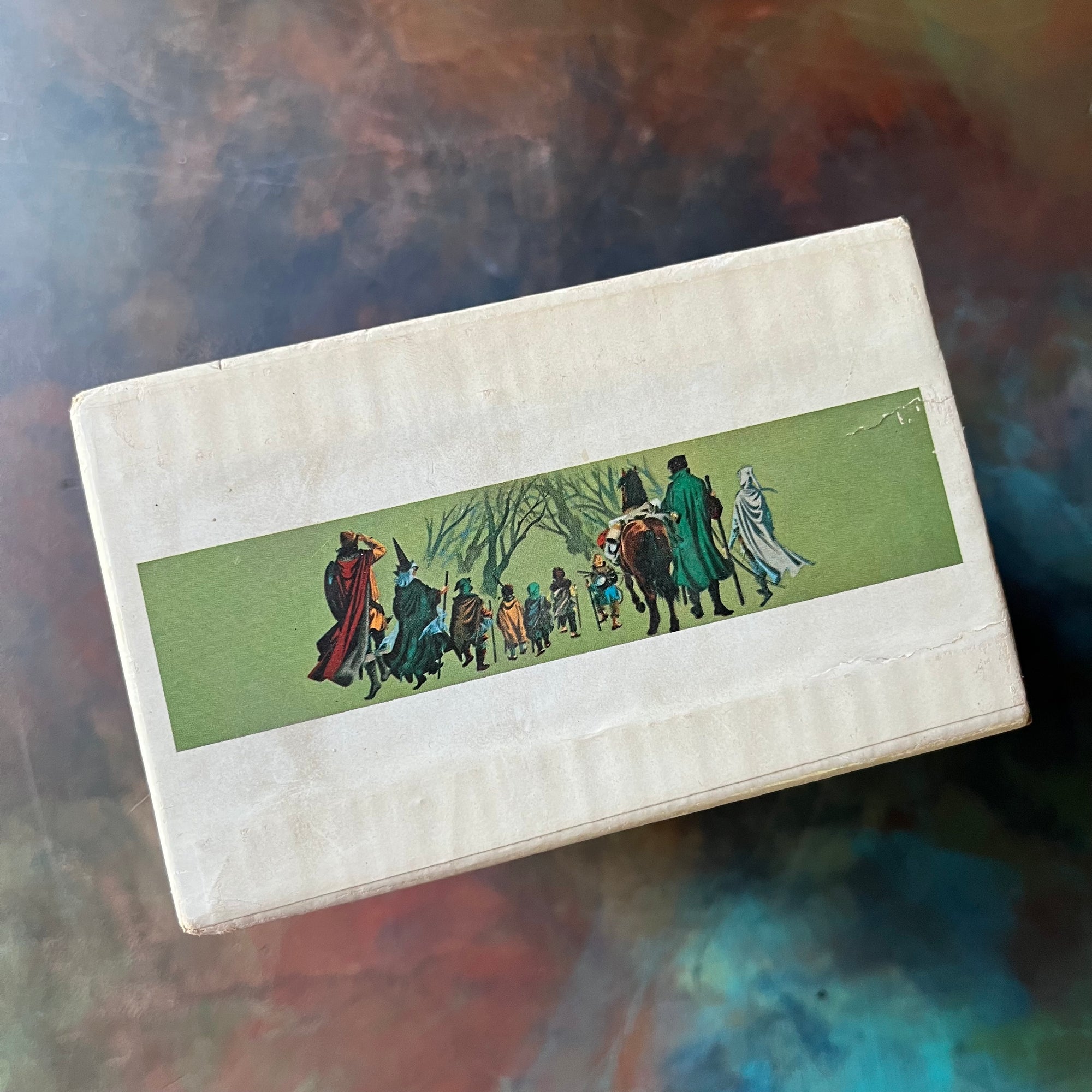 The Lord of the Rings Trilogy Box Set by J. R. R. Tolkien-The Fellowship of the Ring, The Two Towers, and The Return of the King-classic literature everyone should read-view of the top of the box sleeve