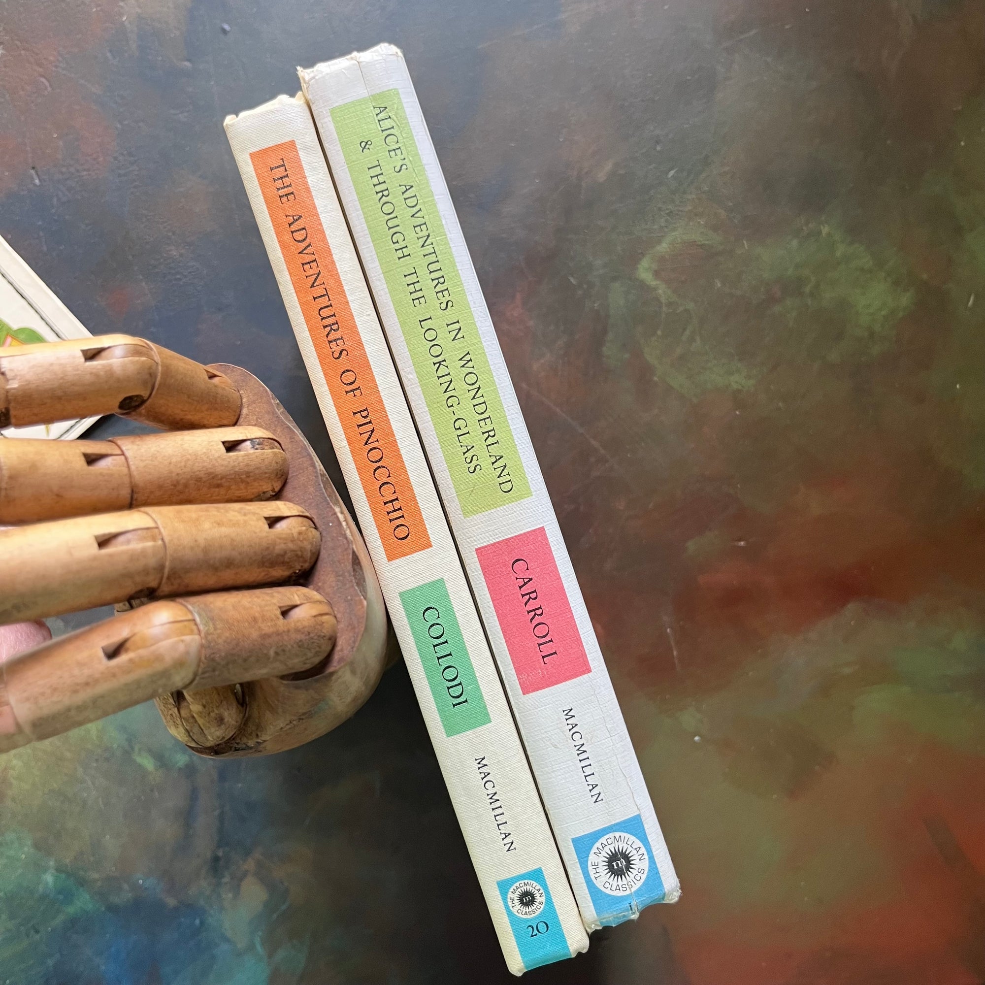 The Macmillan Classics-Pinocchio-Alice's Adventures in Wonderland-Through the Looking Glass-vintage children's classics-classic literature-view of the spines in bright, fun colors - this set makes a wonderful rainbow set for your bookshelf