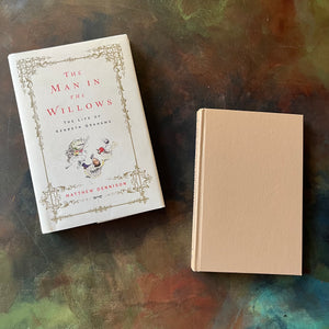 Pair of Kenneth Grahame Books: The Man in the Willows: The Life of Kenneth Grahame and The Wind in the Willows written by Kenneth Grahame & Illustrated by Tasha Tudor-view of the front covers - note the dust jacket is present for The Man in the Willows.